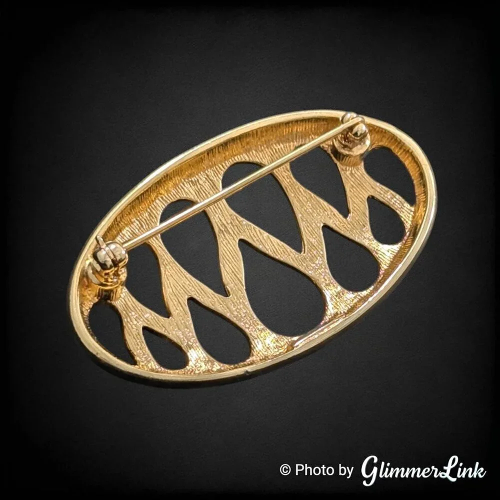 Vintage Monet Openwork Oval Shaped Teardrop Cut Out Gold Tone Brooch